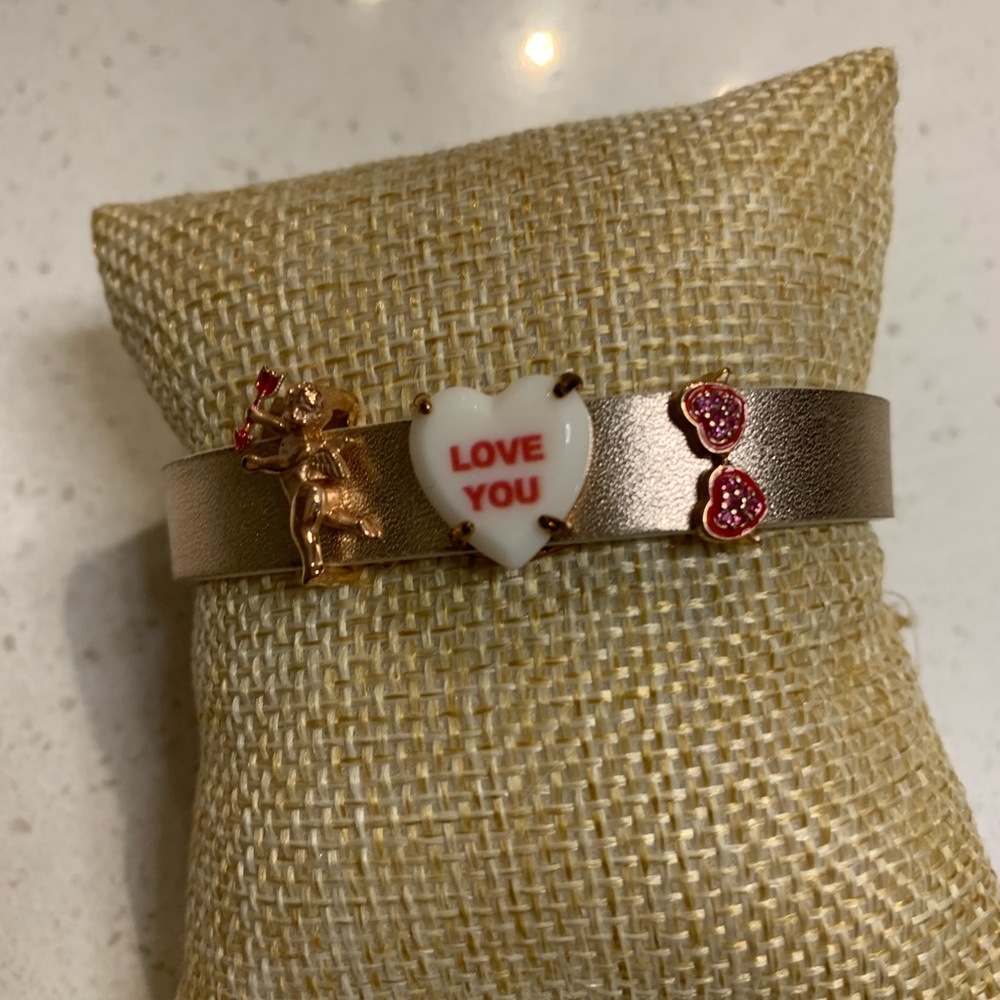 Retired gold band with 3 valentine charms